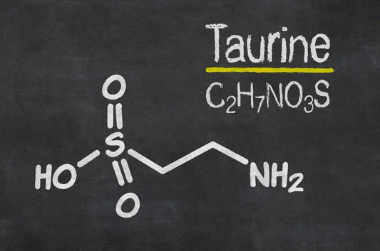 A blackboard appears with the text "Taurine C2H7NO3S" written on it.